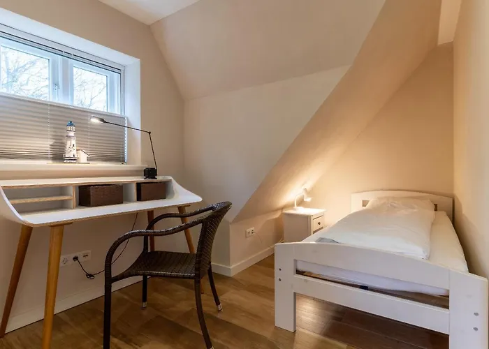 Semesterbostad Mole Hues Reetdachhaus Mole Hues Sankt Peter-Ording