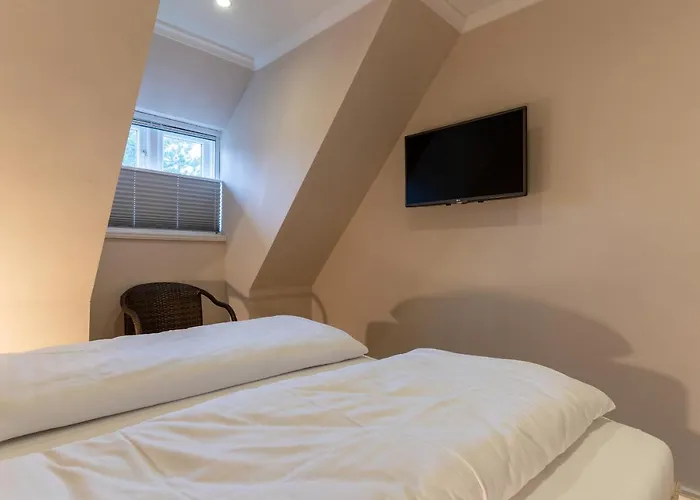 Semesterbostad Mole Hues Reetdachhaus Mole Hues Sankt Peter-Ording